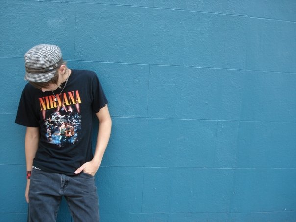 Portrait against blue wall