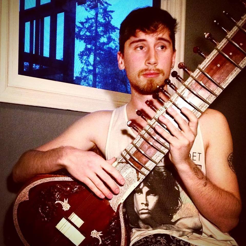 Julian with sitar in studio